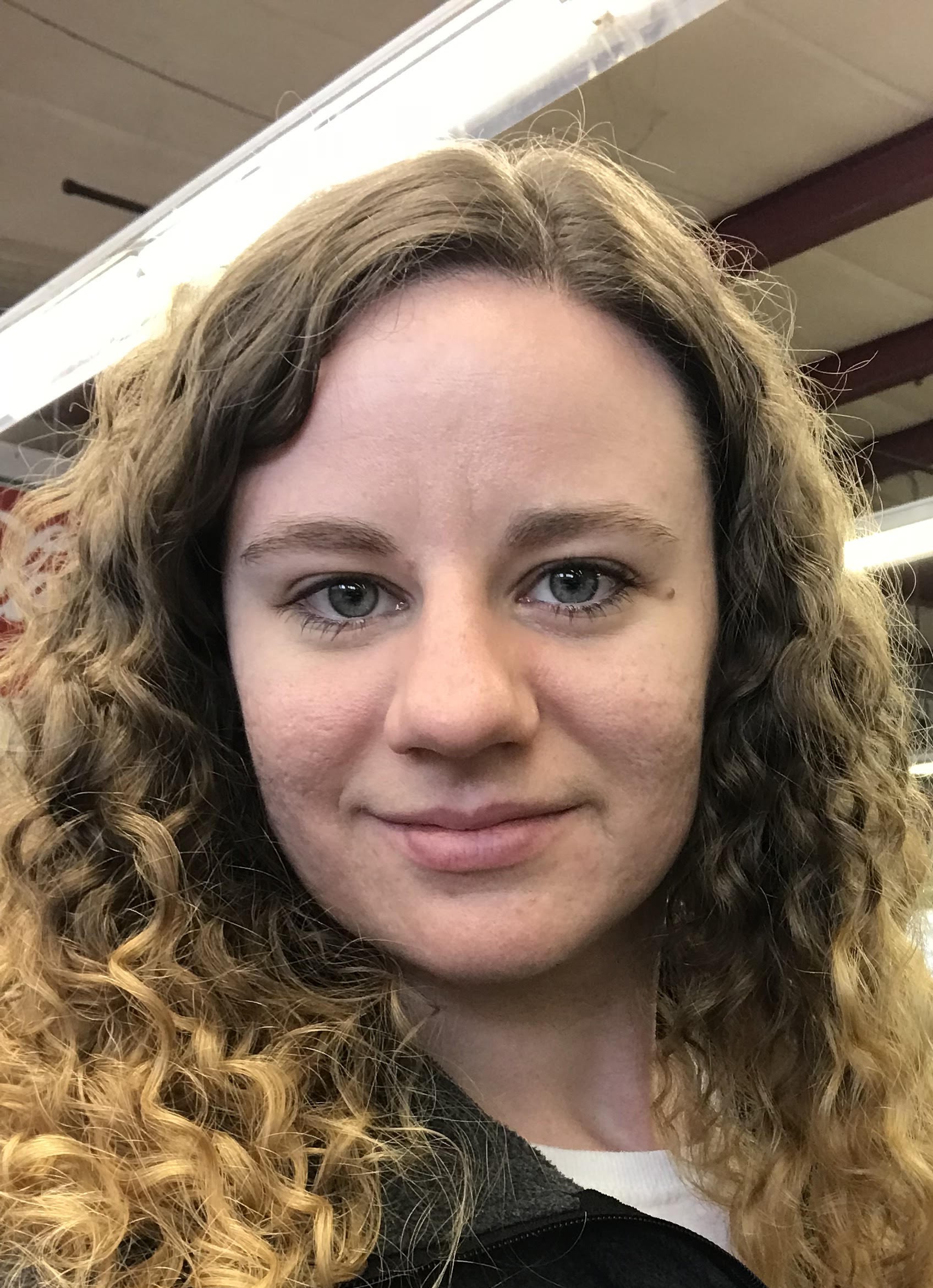 Portrait of Jess, the owner and operator of Jebeno Cleaning